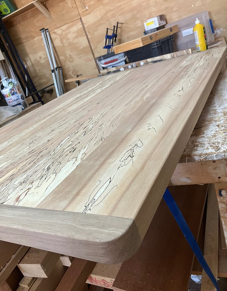 Spalted beach and walnut breadboard end dining table book matched