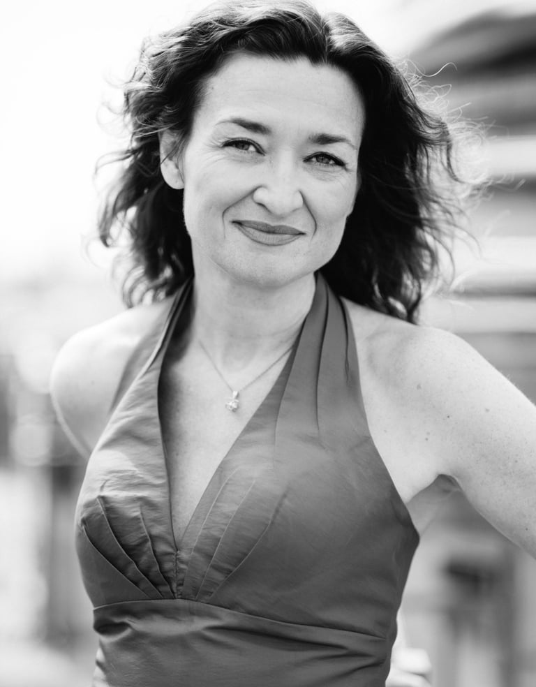 a woman in a dress with a dress on