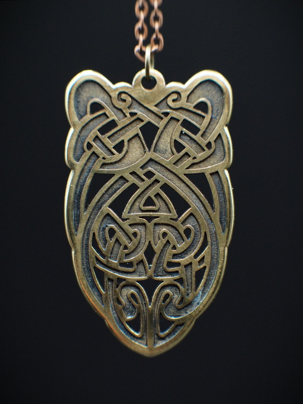 A 1.64mm brass pendant custom adapted from customer's graphics, cut and engraved