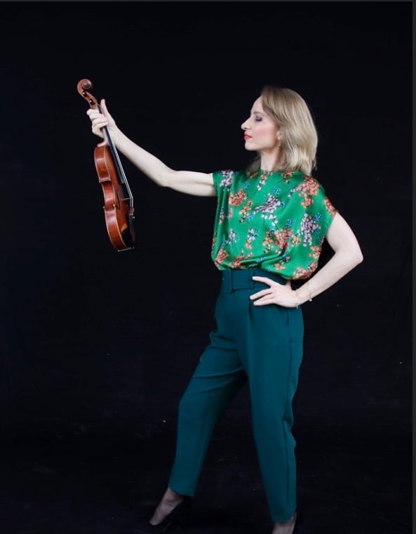 Houston violin teacher with her violin