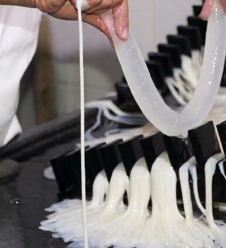 A factory worker caliberating sheep casing on caliber meter at fivestarcasing.com