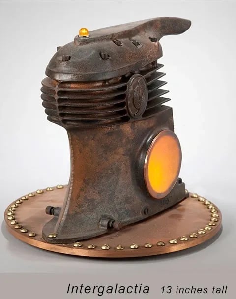 Found object lighted sculpture named Intergalactia by artist Tal Avitzur.