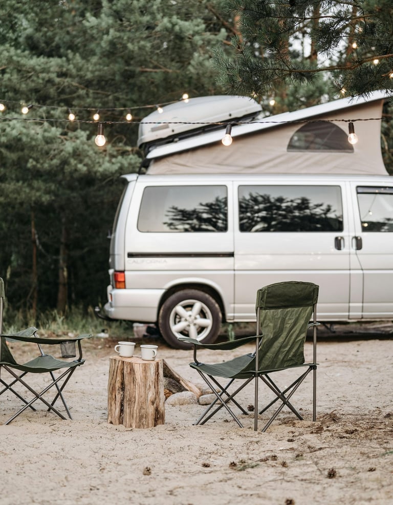A Campervan with a rooftop tent, ready for a camping adventure.