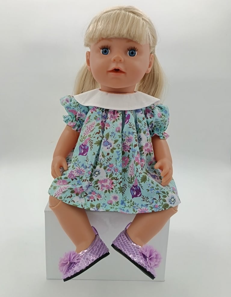 Zapf Big Sister doll in turquoise dress