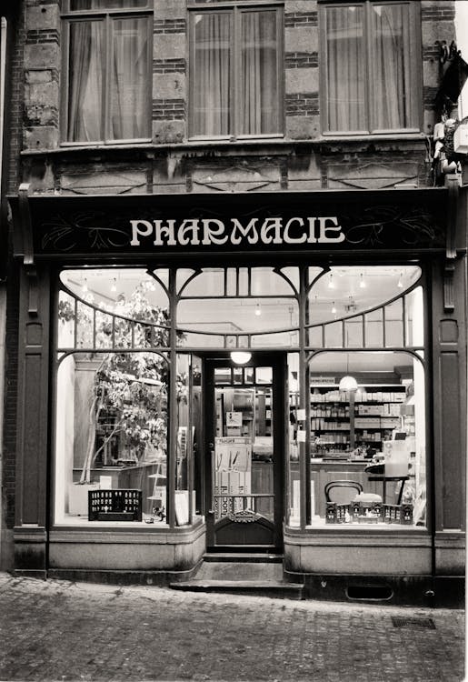 a store front door of a pharmacy shop