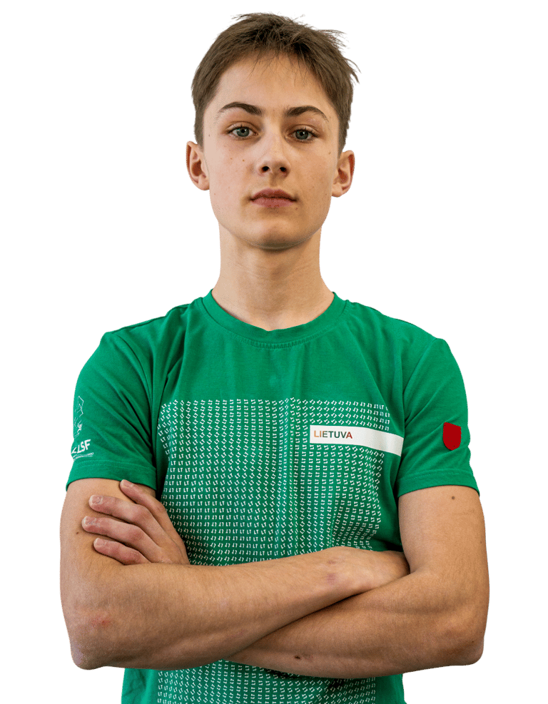 a boy in a green shirt