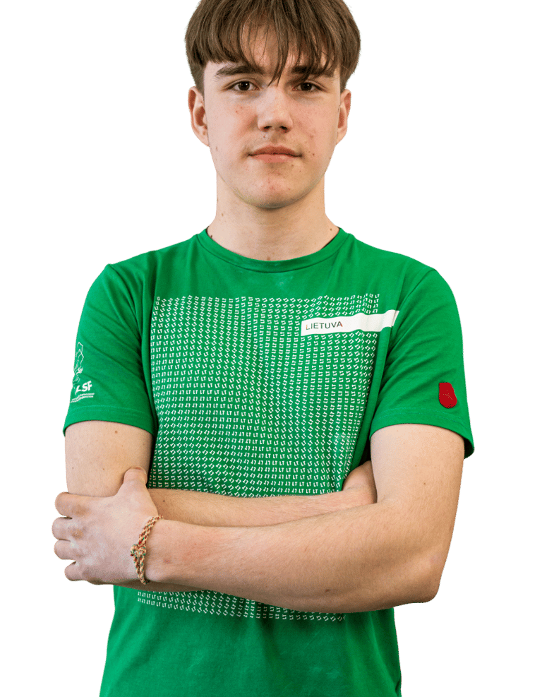 a boy in a green shirt