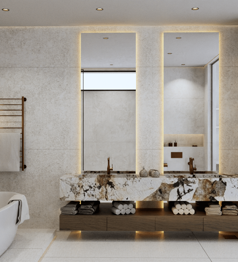 Modern bathroom with a white freestanding tub, a towel warmer and marble accents.