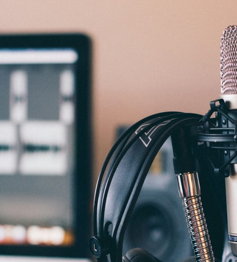 Professional voice over recording in home studio with high-quality audio equipment