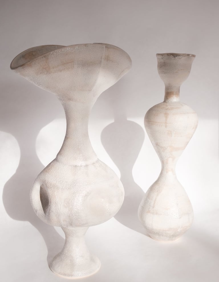 large sculptural minimalist vessels with heavily textured glaze, neutral colors