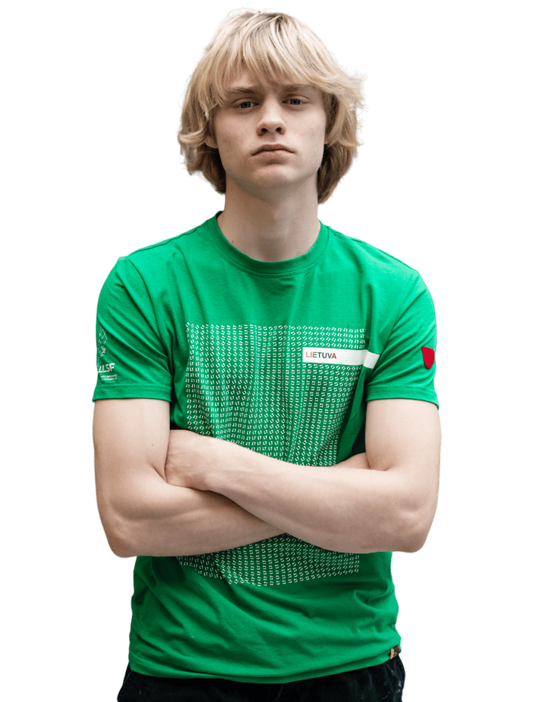 a boy in a green shirt