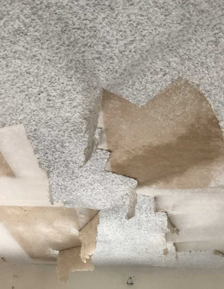 scraping off popcorn texture