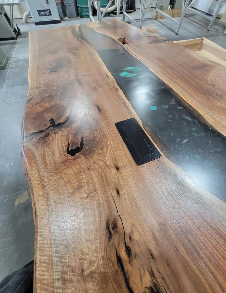 Luxury executive boardroom table crafted from solid Black Walnut and black epoxy resin