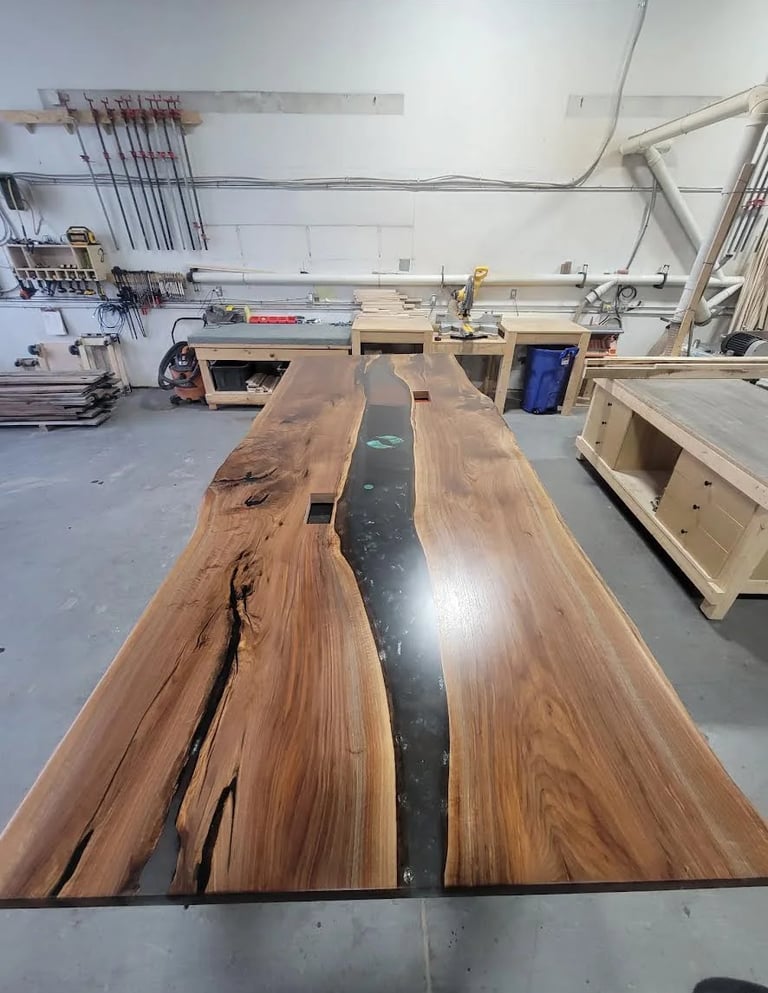 Handcrafted Canadian Black Walnut boardroom table with custom steel legs