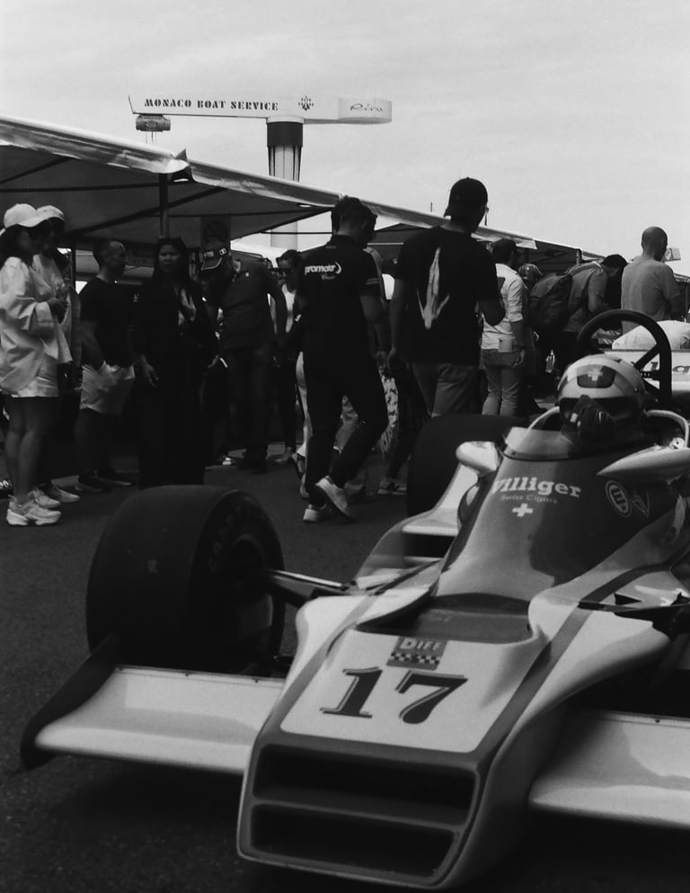 a race car driver getting ready before the race