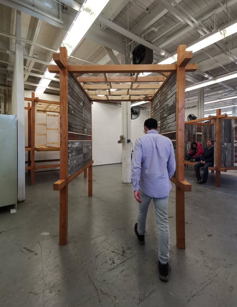 a man walking through an unfinished construction project