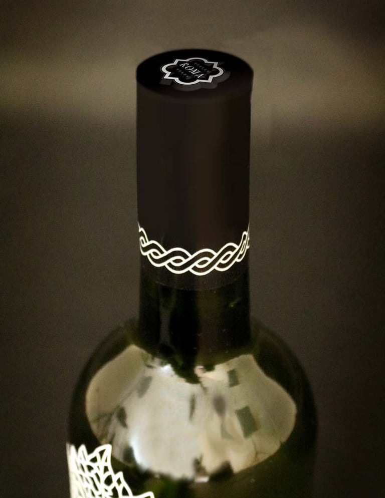 Top view of wine bottle on dark background