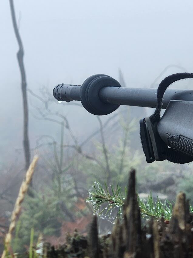Image of a Limbsaver deresonator on a barrel over looking foggy valley.