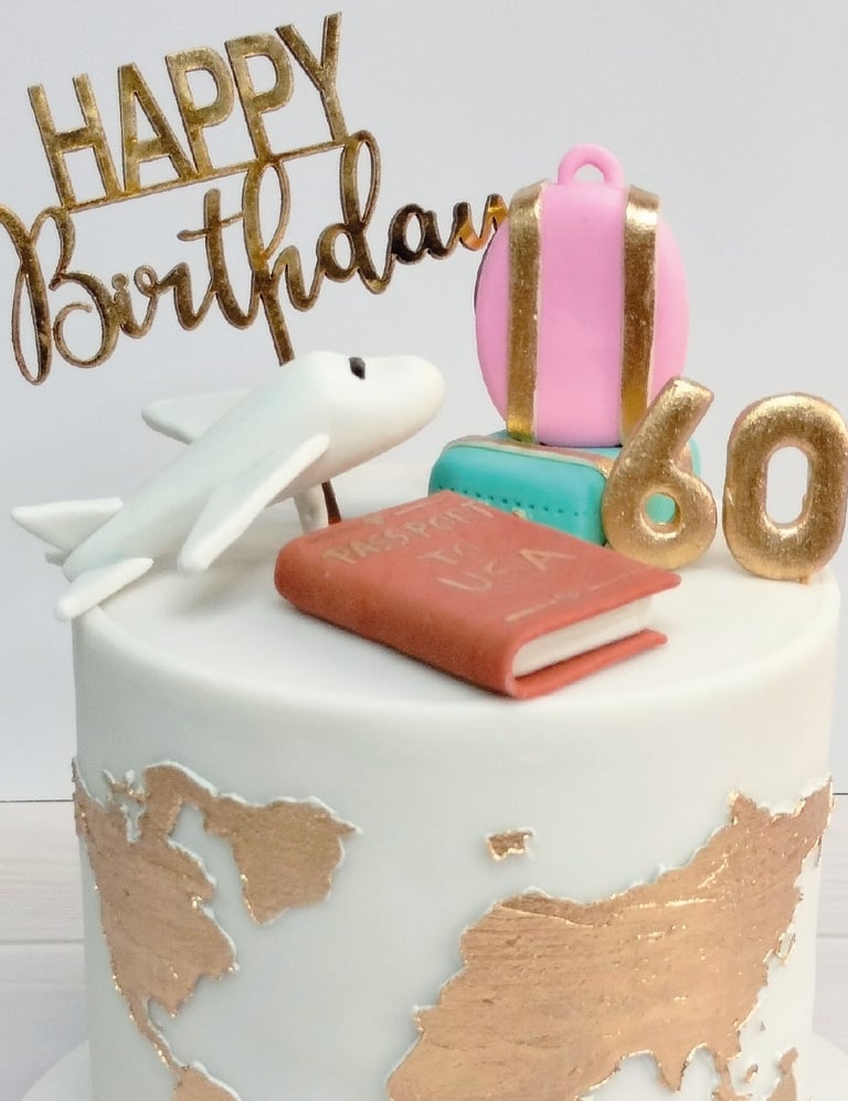 a birthday cake with a map of the world