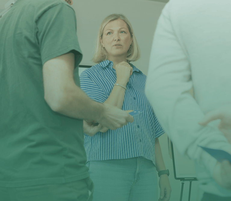 Iris Van Belleghem als teamcoach tijdens een workshop