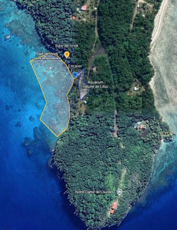 a map of a small island with a yellow line of a yellow line of a