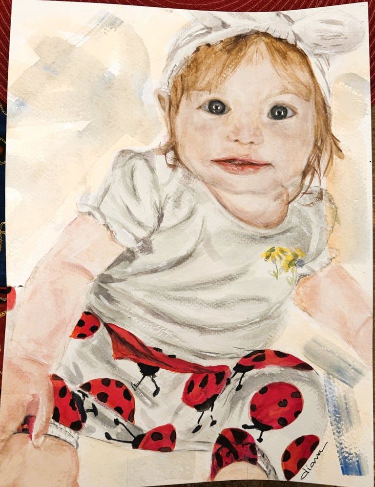 a painting of a baby's face wearing ladybug pants
