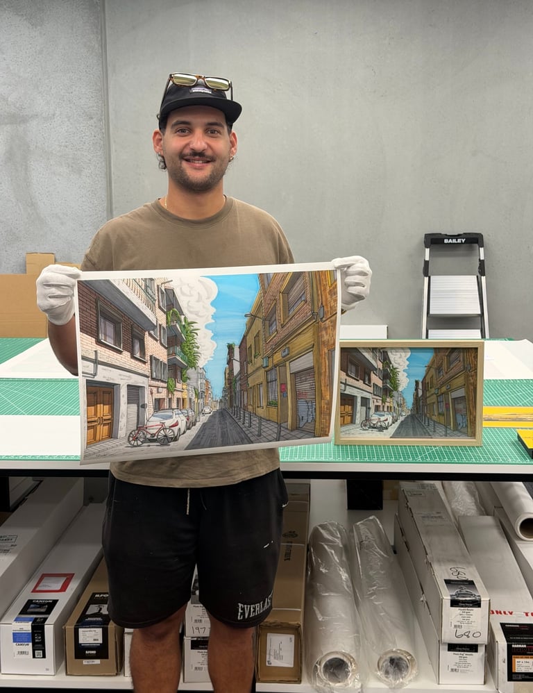 Artist holding an urban street art canvas print in a professional print studio