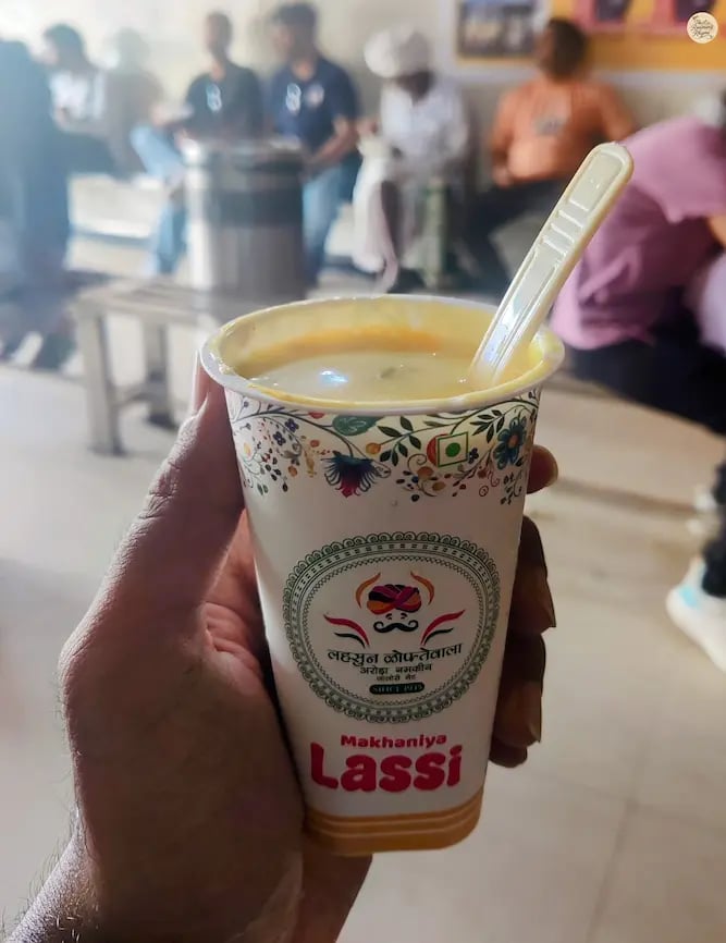 A glass of traditional Makhania Lassi in Jodhpur, rich & creamy Rajasthani drink.