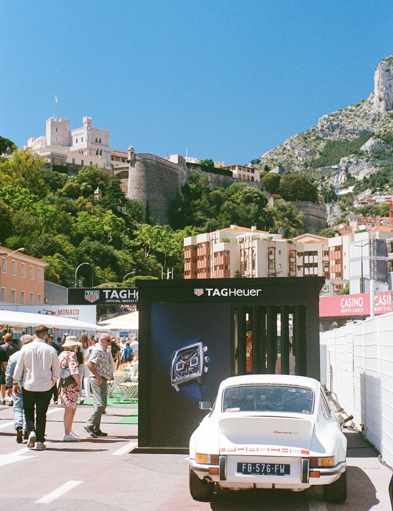a race car parked in the paddock in Monaco