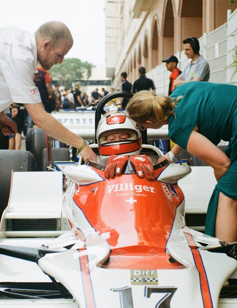 a race car driver getting ready before the race