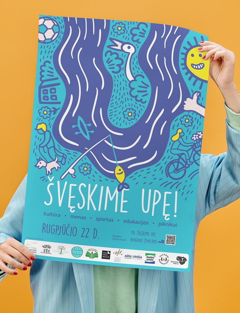 Woman holding first poster from the festival.