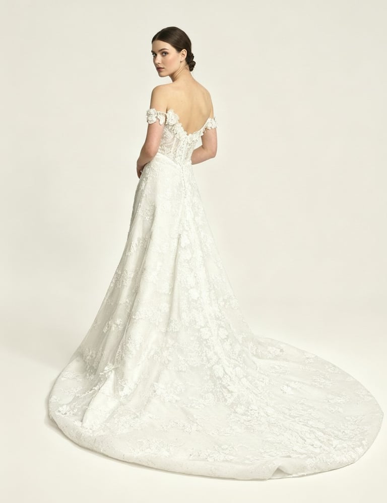 Elegant off-the-shoulder lace wedding dress with a long floral train and low back detail.