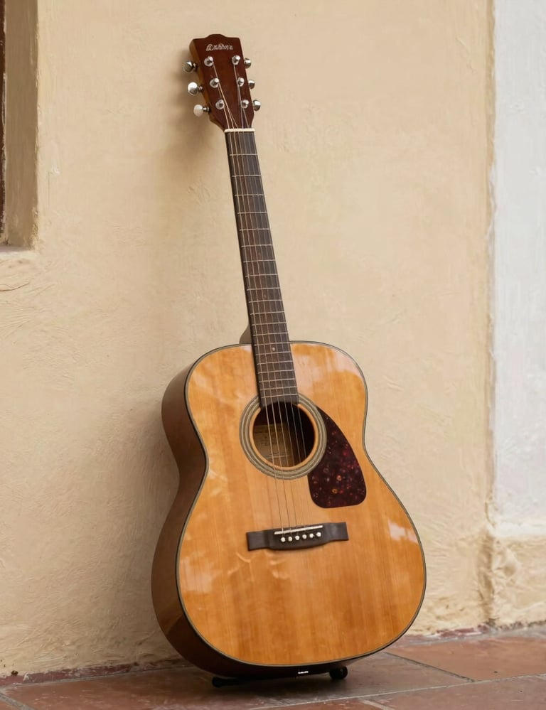 A detailed shot of an acoustic guitar leaning against a textured wall in a Venezuelan colonial-style patio. The lighting is warm cream, reflecting a soulful and authentic musical journey.