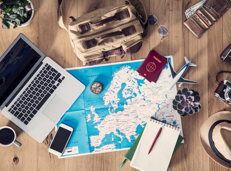 Travel essentials. Laptop, Phone, Map, Passport, Camera, Airplane, Journal 