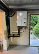a tankless water heater in a garage