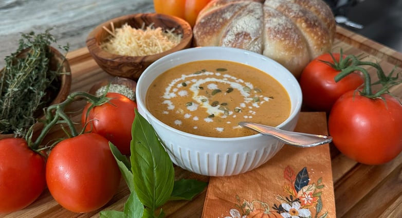 Creamy pumpkin soup with pumpkin shaped sourdough bread