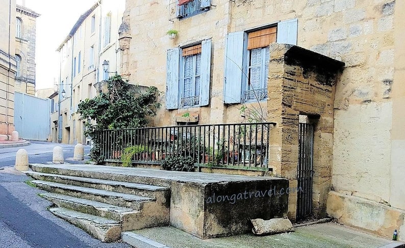 Blue window frames on a house  in Montpellier, France - an offbeat destination not to be missed!