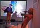 David nu perruqué en Sade s'adresse à un spectateur qui danse | Les Camps de l'Amor | David Noir | Photo Karine Lhémon