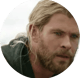 A headshot of a man with a concern look on his face.