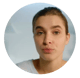 Young women headshot, with light brown hair pulled back.