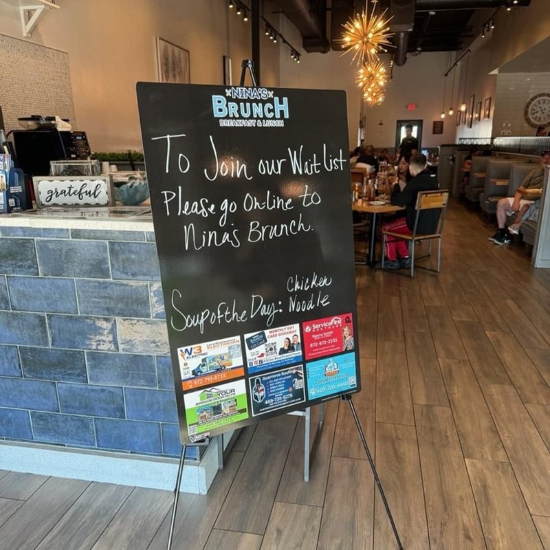 Custom message board displayed inside Nina's Brunch restaurant
