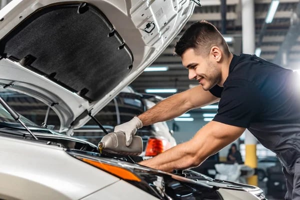 Professional oil change service being performed at Adams Concierge Auto in Wesley Chapel, FL