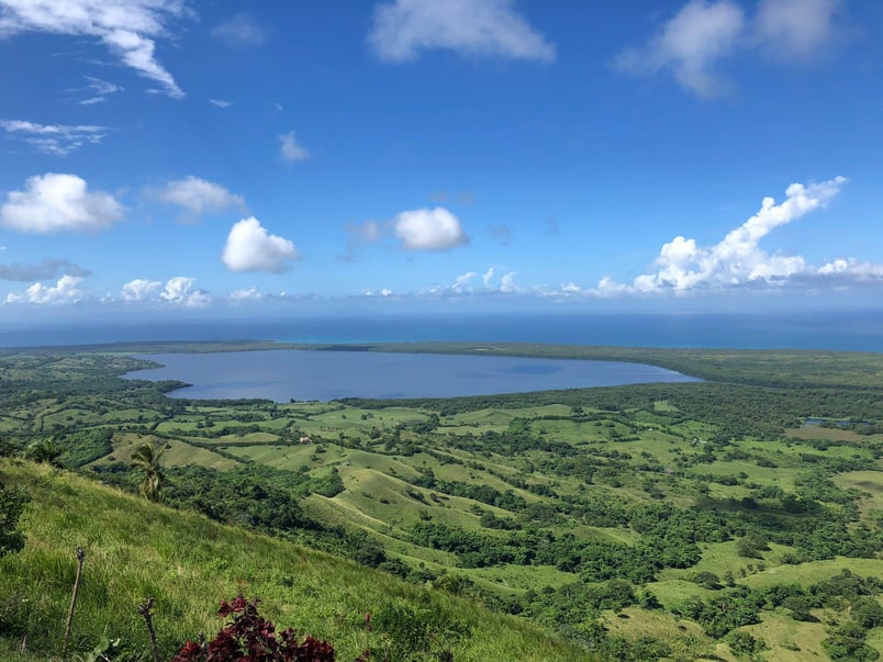 Laguna Redonda panoramic view in Miches Dominican Republic with green hills and blue sky