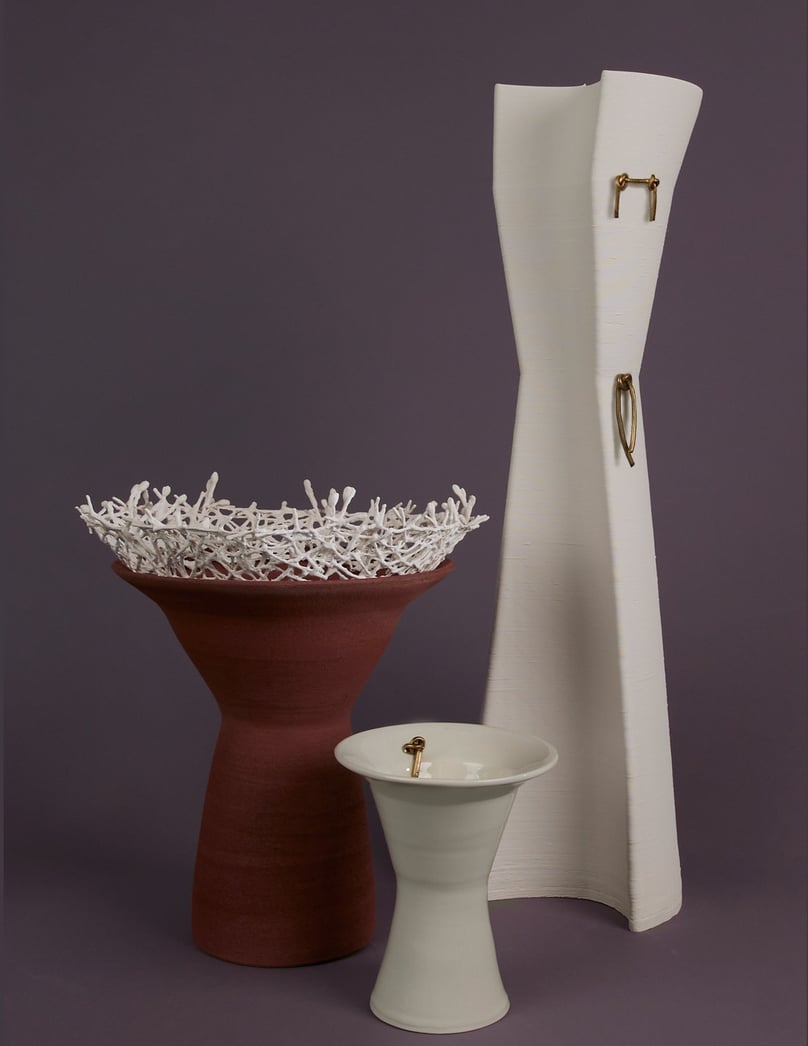3 ceramic art vessels, in porcelain with bronze details. Wheel-thrown and 3d printed porcelain.