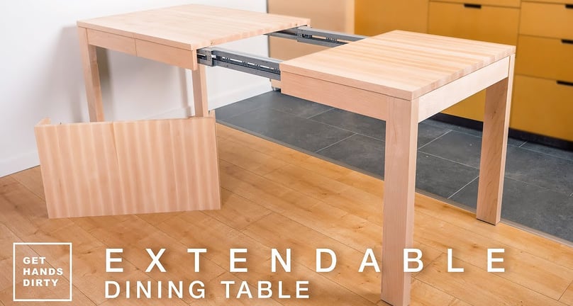 A table with its extendable parts is visible. It sits 2 or 4 people when closed and 10 when extended