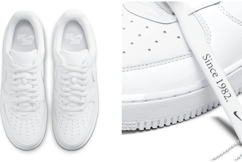 a pair of white sneakers with a shoelacee on the side