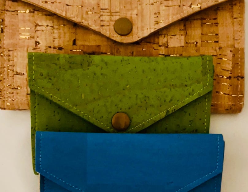 three wallets constructed of cork using Spencer Ogg's Corkodian pattern