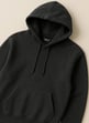 a black hoodie with a hoodie and a hoodie