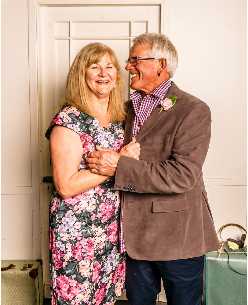 husband and wife hugging