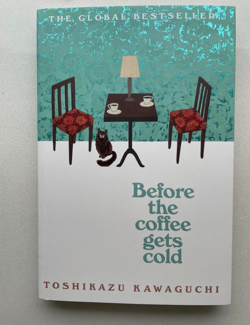 a book cover of before the coffee gets cold